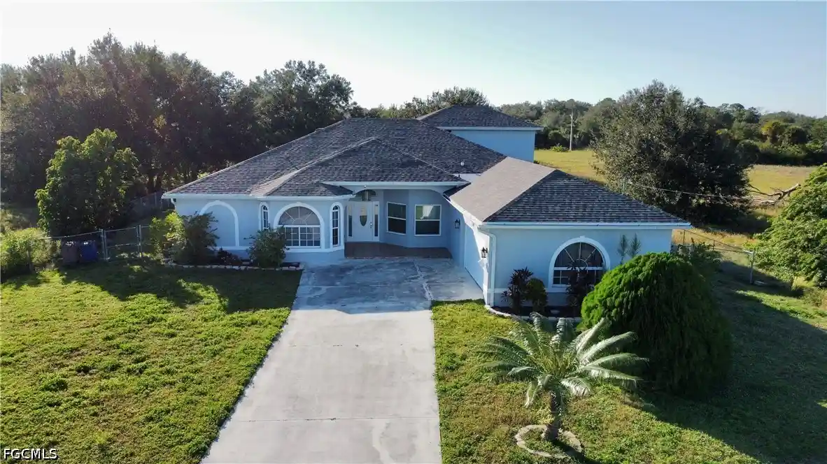 Photo 1 of Single family home for sale at 1709 Moore Ave, Lehigh Acres, FL 33972 | MLS# 2026039137 | Listing updated on 2026-10-26