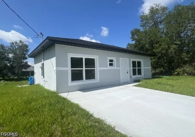 Photo 1 of Single family home for sale at 706 Azure Ave, Lehigh Acres, FL 33974 | MLS# 2026039849 | Listing updated on 2026-09-24