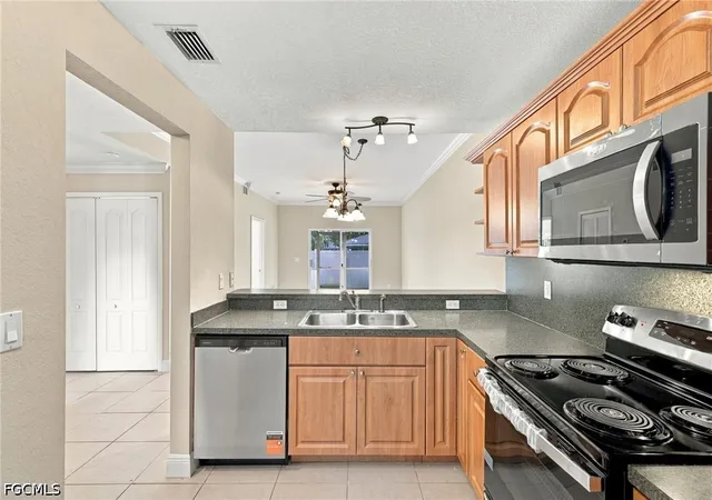 Photo 1 of Condo for sale at 1227 SE 23rd Place #2, Cape Coral, FL 33990 | MLS# 2026039936 | Listing updated on 2026-10-03