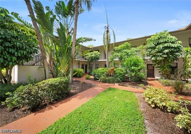 Listing Photo 1 - Condo for sale in building located at 1833 Courtyard Wy, Naples, FL 34112 - Unit #105