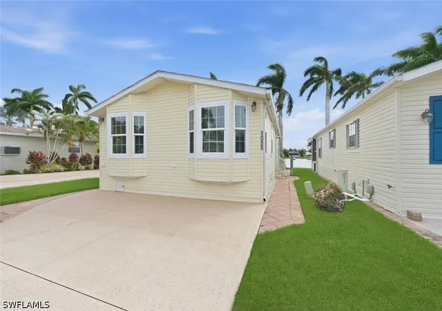 Photo 2 of Manufactured home for sale at 1055 Diamond Lake Cir, Naples, FL 34114 | MLS# 226033257 | Listing updated on 2026-09-29