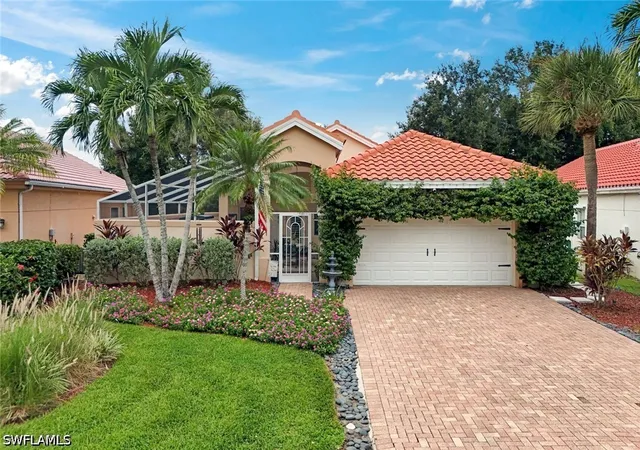 Single family home for sale at 129 Sabal Lake Dr, Naples, FL 34104 | MLS# 226033726