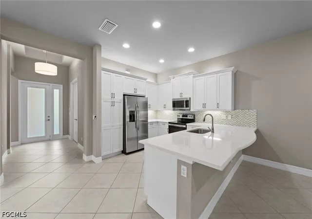Listing Photo 4 - Condo for sale in building located at 11952 Five Waters Cir, Fort Myers, FL 33913