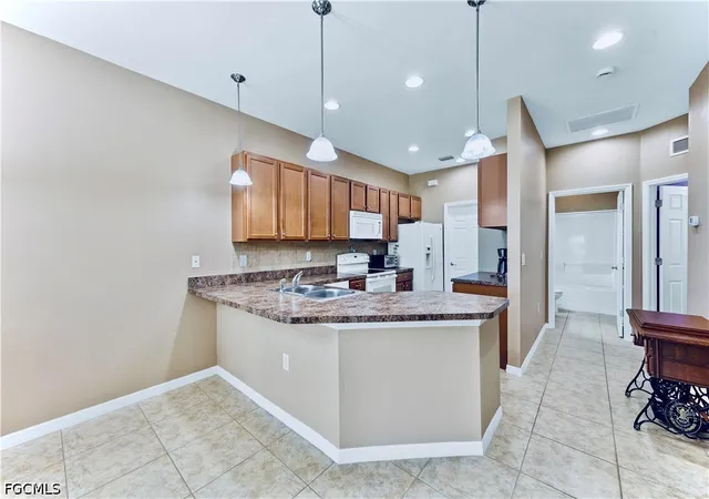 Photo 4 of Townhouse for sale at 10781 Crossback Ln, Lehigh Acres, FL 33936 | MLS# 2026040307 | Listing updated on 2026-09-24