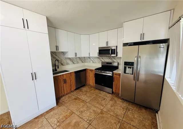 Photo 3 of Single family home for sale at 124 Sebring Cir, Lehigh Acres, FL 33936 | MLS# 2026040321 | Listing updated on 2026-10-02