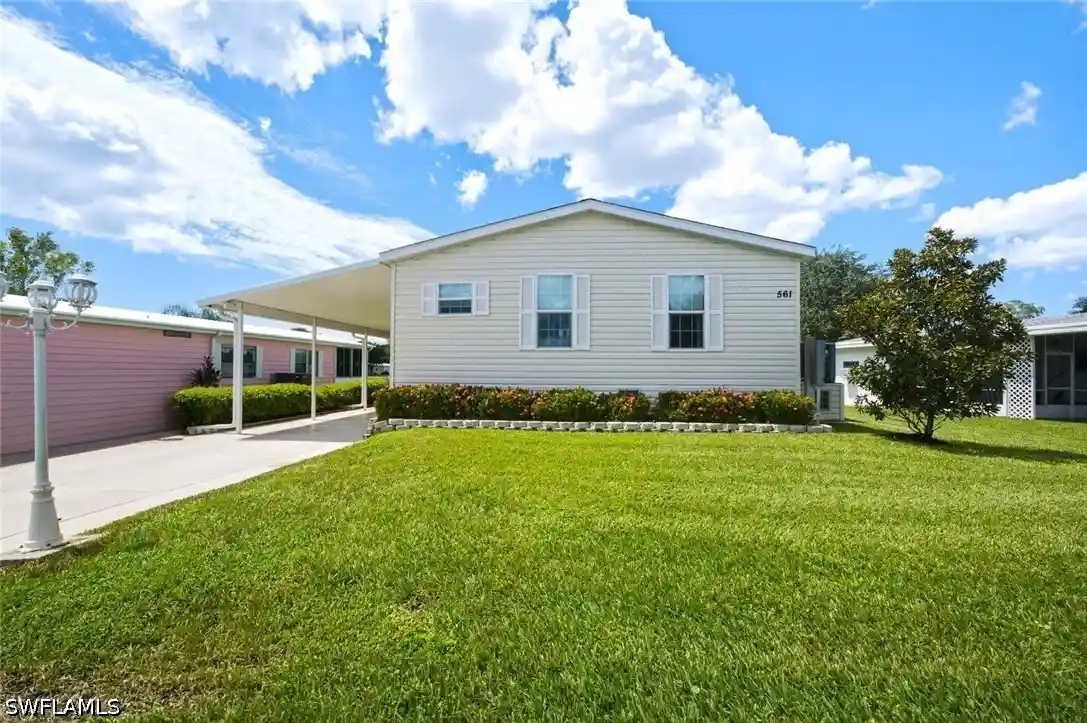Manufactured home for sale at 561 Charlemagne Blvd, Naples, FL 34112 | MLS# 226034102