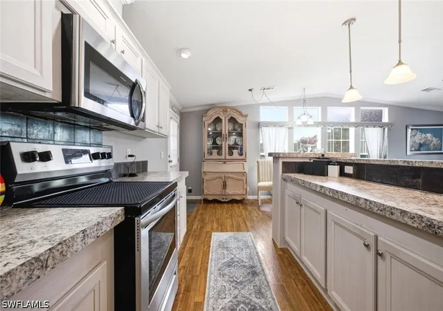 Photo 3 of Manufactured home for sale at 561 Charlemagne Blvd, Naples, FL 34112 | MLS# 226034102 | Listing updated on 2026-10-04