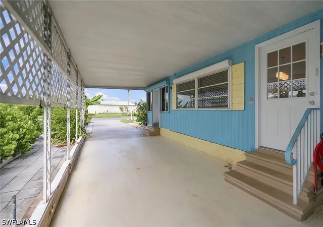 Photo 3 of Manufactured home for sale at 483 Riviera Blvd W, Naples, FL 34112 | MLS# 226034323 | Listing updated on 2026-10-02