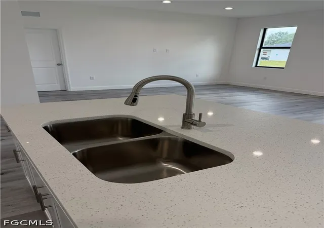 Photo 3 of Single family home for sale at 613 Greenbriar Blvd NW, Lehigh Acres, FL 33972 | MLS# 2026040467 | Listing updated on 2026-09-25
