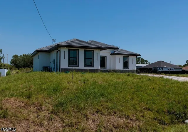 Photo 1 of Single family home for sale at 1010 Wagner Ave, Lehigh Acres, FL 33972 | MLS# 2026040664 | Listing updated on 2026-09-29