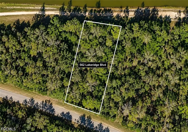Photo 1 of Land for sale at 562 Lakeridge Blvd, Lehigh Acres, FL 33972 | MLS# 2026040704 | Listing updated on 2026-09-28