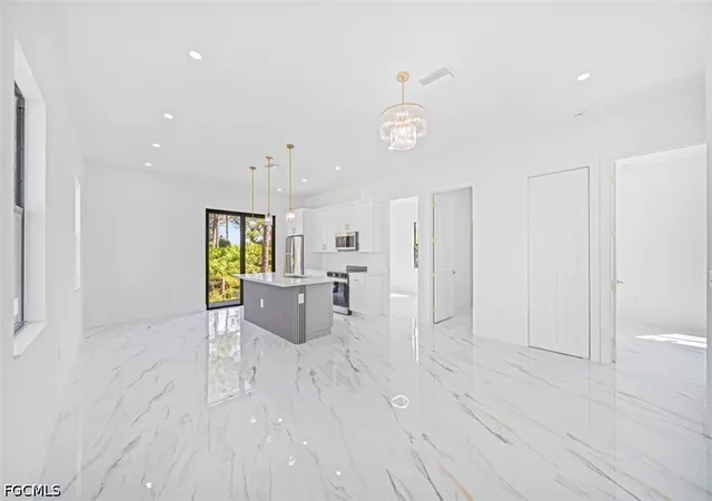 Photo 2 of Single family home for sale at 1005 SW Brenton Ave, Lehigh Acres, FL 33974 | MLS# 2026040743 | Listing updated on 2026-10-29