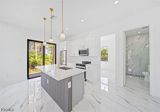 Photo 3 of Single family home for sale at 1005 SW Brenton Ave, Lehigh Acres, FL 33974 | MLS# 2026040743 | Listing updated on 2026-10-29