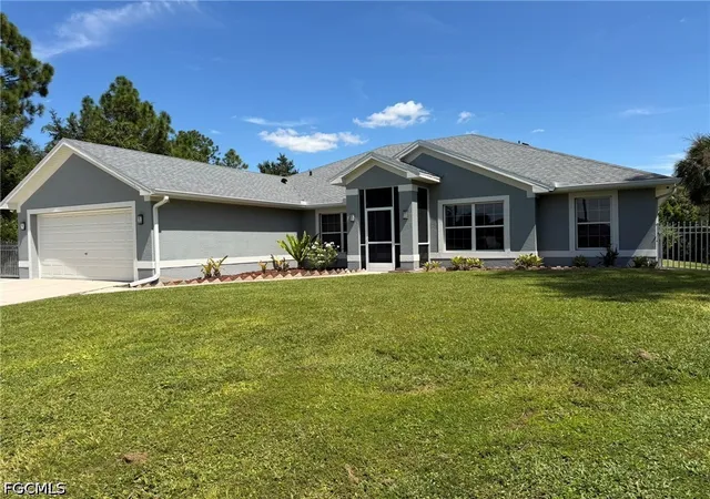 Single family home for sale at 702 Calvin Ave, Lehigh Acres, FL 33972 | MLS# 2026040794 | Listing updated on 2026-09-30