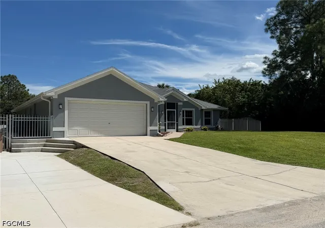 Photo 1 of Single family home for sale at 702 Calvin Ave, Lehigh Acres, FL 33972 | MLS# 2026040794 | Listing updated on 2026-09-30