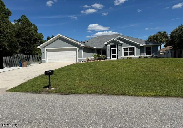 Photo 2 of Single family home for sale at 702 Calvin Ave, Lehigh Acres, FL 33972 | MLS# 2026040794 | Listing updated on 2026-09-30