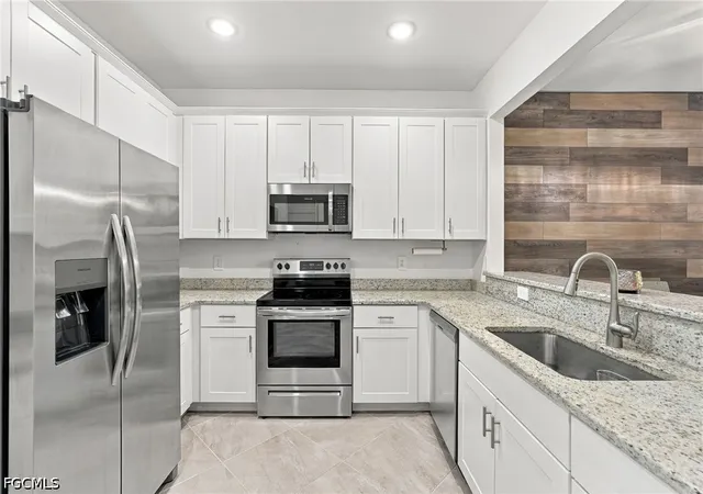 Photo 2 of Townhouse for sale at 14159 Pine Lodge Ln, Fort Myers, FL 33913 | MLS# 2026040795 | Listing updated on 2026-09-29