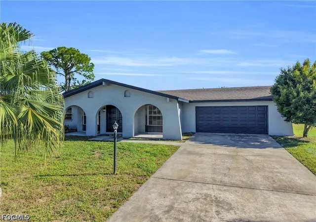 Photo 1 of Single family home for sale at 502 Parkside St, Lehigh Acres, FL 33936 | MLS# 2026040906 | Listing updated on 2026-10-03