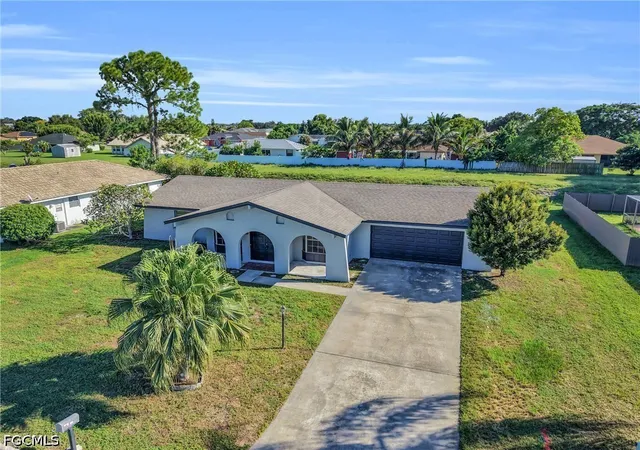 Photo 4 of Single family home for sale at 502 Parkside St, Lehigh Acres, FL 33936 | MLS# 2026040906 | Listing updated on 2026-10-03