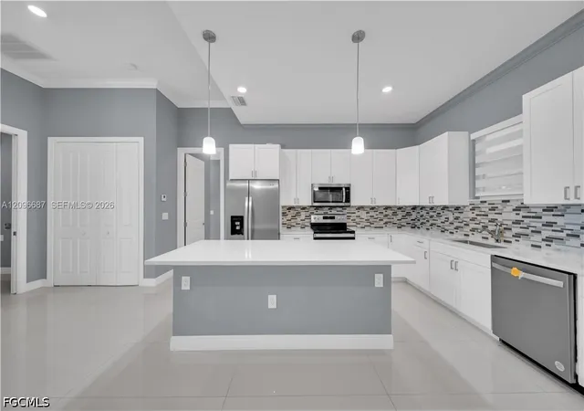 Single family home for sale at 105 15 Street E, Lehigh Acres, FL 33972 | MLS# 2026040972 | Listing updated on 2026-09-30