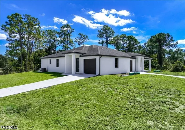 Photo 2 of Multi family home for sale at 701 703 Homestead Rd S, Lehigh Acres, FL 33974 | MLS# 2026041029 | Listing updated on 2026-10-01