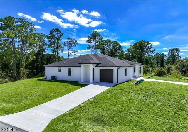Photo 3 of Multi family home for sale at 701 703 Homestead Rd S, Lehigh Acres, FL 33974 | MLS# 2026041029 | Listing updated on 2026-10-01