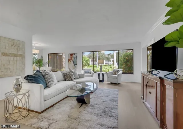 Listing Photo 1 - Condo for sale in building located at 5954 Pelican Bay Blvd, Naples, FL 34108 - Unit #212