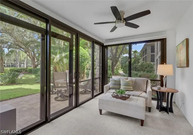 Listing Photo 3 - Condo for sale in building located at 5954 Pelican Bay Blvd, Naples, FL 34108 - Unit #212