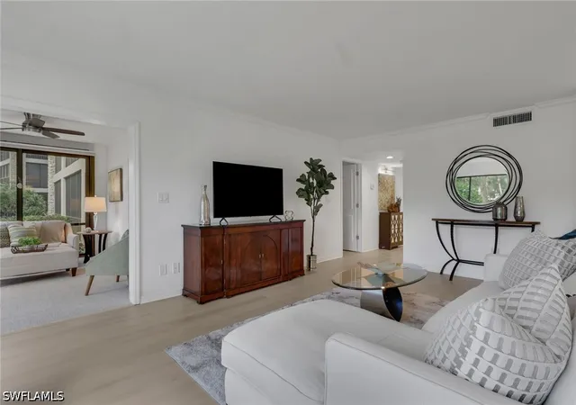 Listing Photo 5 - Condo for sale in building located at 5954 Pelican Bay Blvd, Naples, FL 34108 - Unit #212