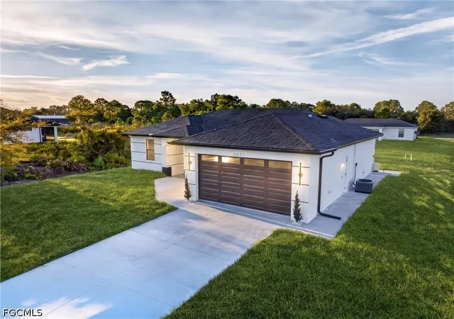 Photo 2 of Single family home for sale at 2621 40th Street W, Lehigh Acres, FL 33971 | MLS# 2026041080 | Listing updated on 2026-09-30