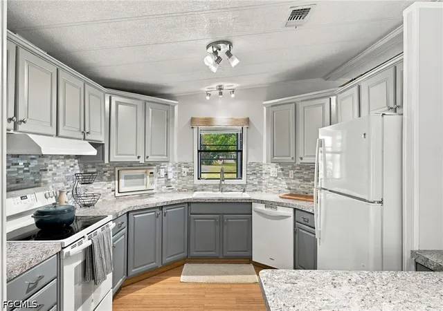 Photo 3 of Manufactured home for sale at 105 Calais Ct, Naples, FL 34112 | MLS# 2026041085 | Listing updated on 2026-09-30