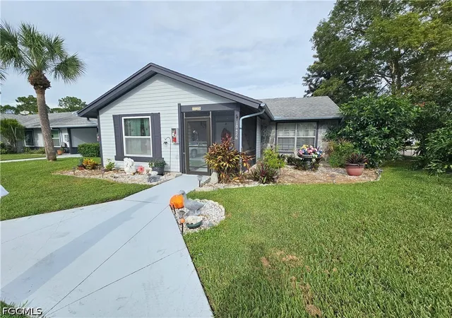 Photo 1 of Townhouse for sale at 10426 Lakeport Ct, Lehigh Acres, FL 33936 | MLS# 2026041123 | Listing updated on 2026-09-30
