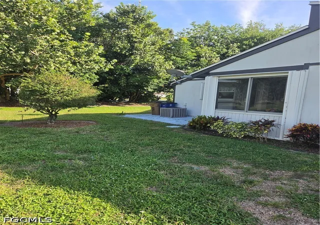 Photo 3 of Townhouse for sale at 10425 New Bedford Ct, Lehigh Acres, FL 33936 | MLS# 2026041182 | Listing updated on 2026-10-06