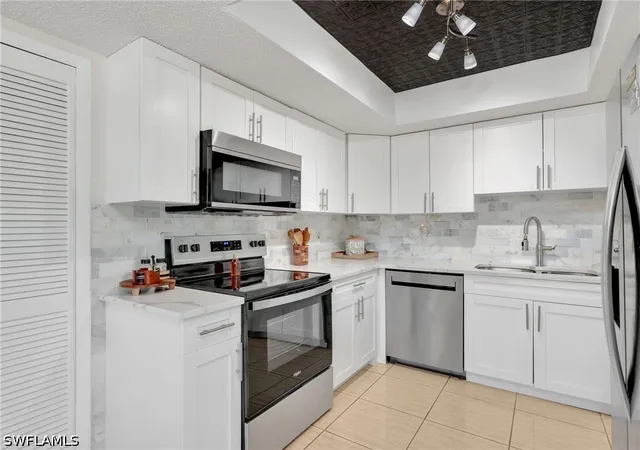 Listing Photo 1 - Condo for sale in building located at 4121 SE 19th Ave, Cape Coral, FL 33904 - Unit #201