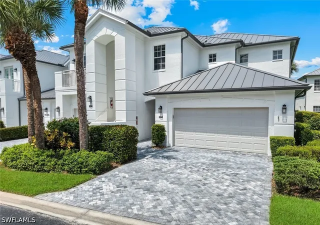 Listing Photo 1 - Condo for sale in building located at 9048 Whimbrel Watch Ln, Naples, FL 34109 - Unit #102