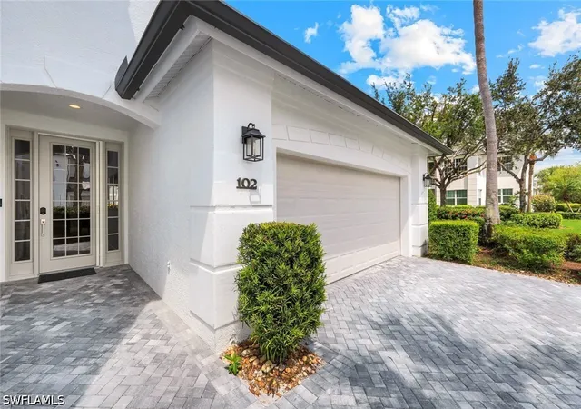Listing Photo 2 - Condo for sale in building located at 9048 Whimbrel Watch Ln, Naples, FL 34109 - Unit #102