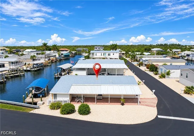 Photo 2 of Manufactured home for sale at 3055 Harpoon Ln, Saint James City, FL 33956 | MLS# 2026041400 | Listing updated on 2026-10-04