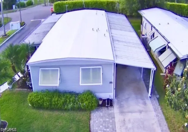 Photo 2 of Manufactured home for sale at 22 Turquoise Ave #22T, Naples, FL 34114 | MLS# 226030835 | Listing updated on 2026-10-05