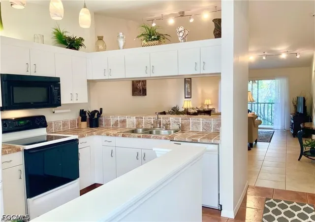 Photo 2 of Condo for sale at 14471 Lakewood Tr Ct #202, Fort Myers, FL 33919 | MLS# 2026041440 | Listing updated on 2026-10-08