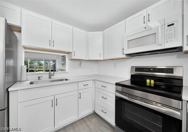 Listing Photo 1 - Condo for sale in building located at 6220 Augusta Dr, Fort Myers, FL 33907 - Unit #117