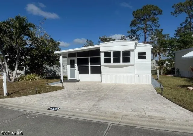 Manufactured home for sale at 469 Vanda Sanctuary, Naples, FL 34114 | MLS# 226035482
