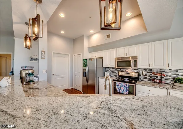 Listing Photo 2 - Condo for sale in building located at 9221 Calle Arragon Ave, Fort Myers, FL 33908 - Unit #203