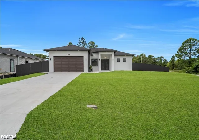 Photo 1 of Single family home for sale at 710 Almelia St E, Lehigh Acres, FL 33974 | MLS# 2026041569 | Listing updated on 2026-10-02