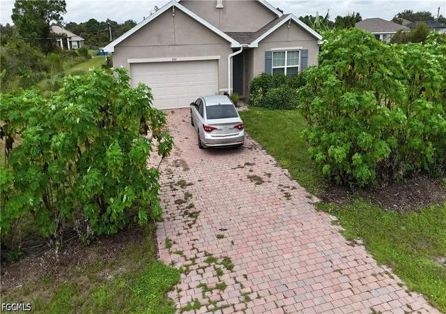 Photo 1 of Single family home for sale at 6011 Joan Ave N, Lehigh Acres, FL 33971 | MLS# 2026041710 | Listing updated on 2026-10-07