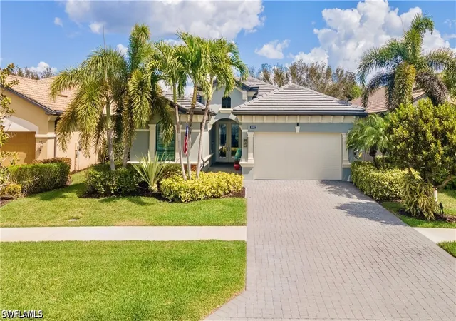 Single family home for sale at 10102 Palazzo Dr, Naples, FL 34119 | MLS# 226035786
