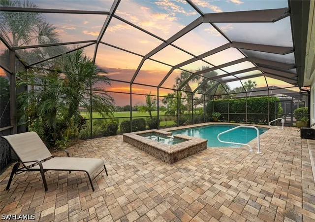 Single family home for sale at 11918 Heather Woods Ct, Naples, FL 34120 | MLS# 226034782