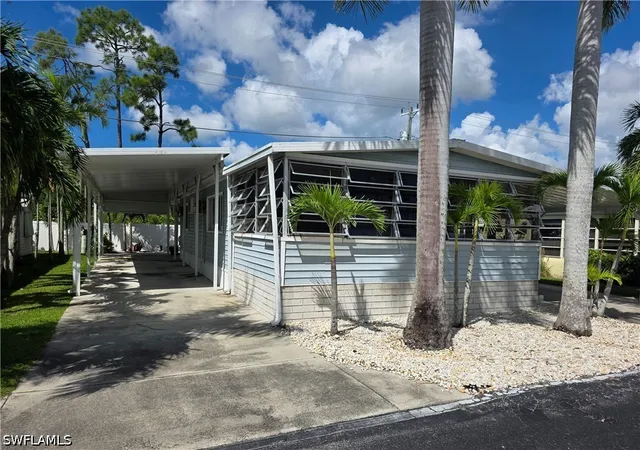 Photo 2 of Manufactured home for sale at 9 Navajo Trl, Naples, FL 34113 | MLS# 226035981 | Listing updated on 2026-10-08