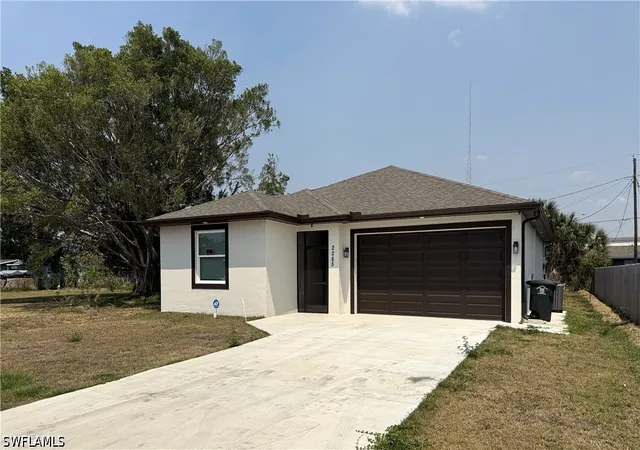 Single family home for sale at 2285 Towles St, Fort Myers, FL 33916 | MLS# 226036003