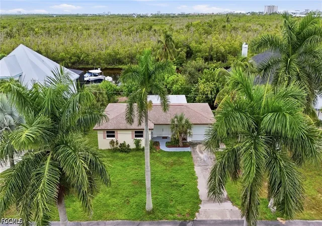 Single family home for sale at 11821 Isle Of Palms Dr, Fort Myers Beach, FL 33931 | MLS# 2026042224