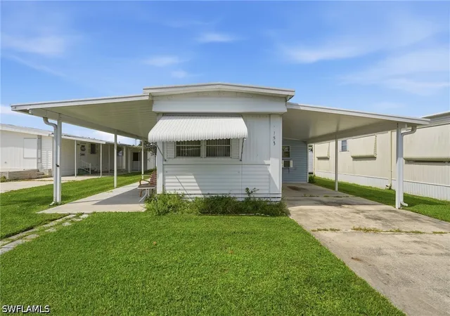 Photo 2 of Manufactured home for sale at 153 Primrose Ln #65, Naples, FL 34114 | MLS# 226035718 | Listing updated on 2026-10-07